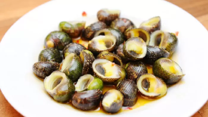 Ốc dừa xào bơ cay
