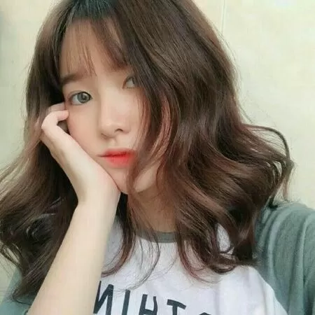 Mullet layer uốn gợn sóng dành cho khuôn mặt trái xoan