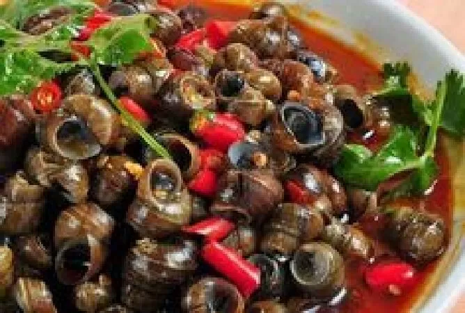Ốc xào me
