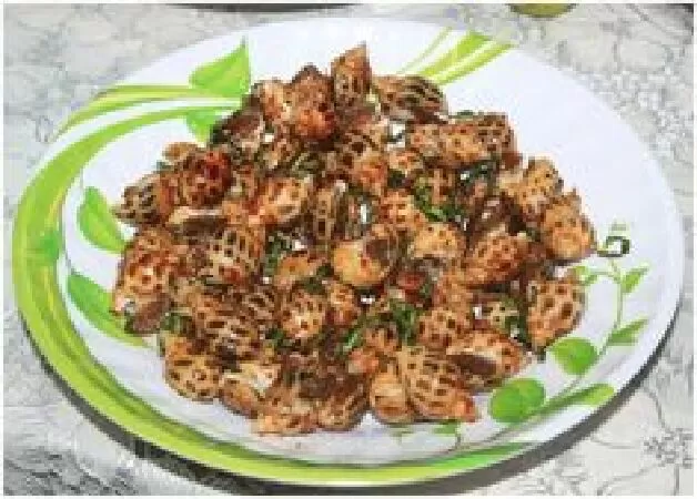 Ốc hương xào tỏi lá chanh