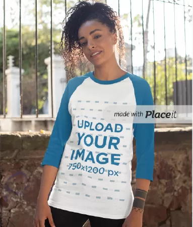 Mockup of a Curly-Haired Woman Wearing a Raglan Three Quarters Sleeve Tee
