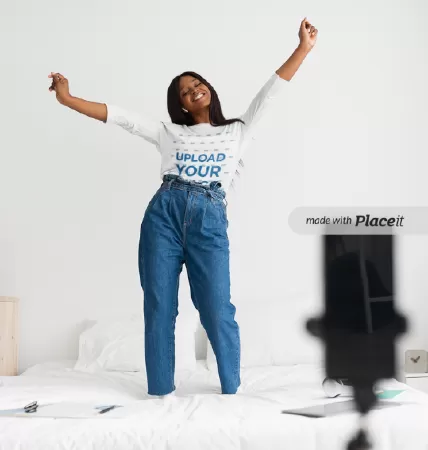 3/4 Sleeve Tee Mockup of a Woman Taking a Selfie in Her Bedroom